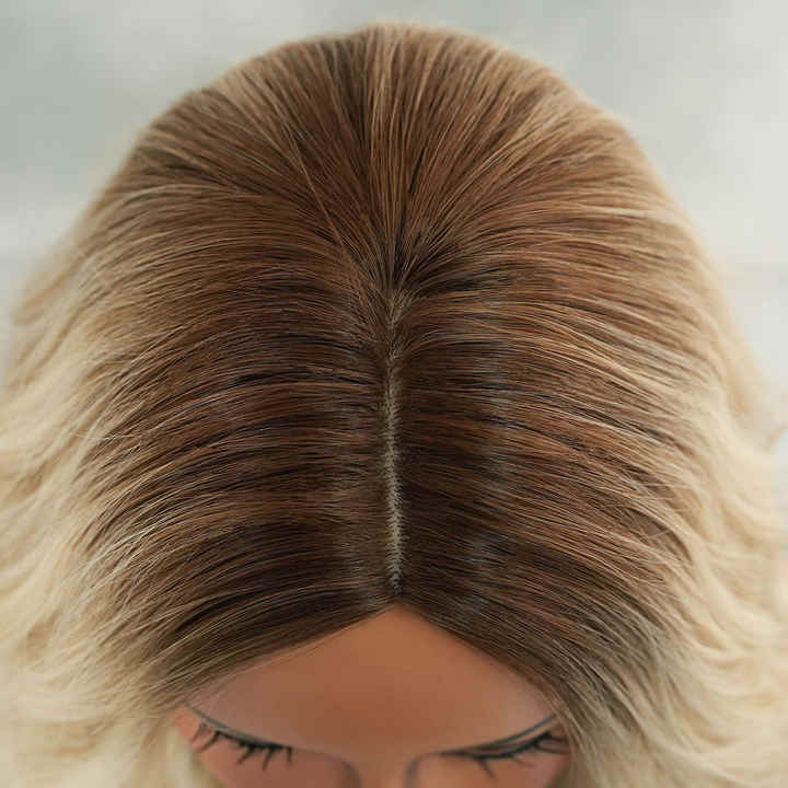 Blonde shoulder-length curly synthetic heat-resistant wig for women with natural hair parting and matte finish
